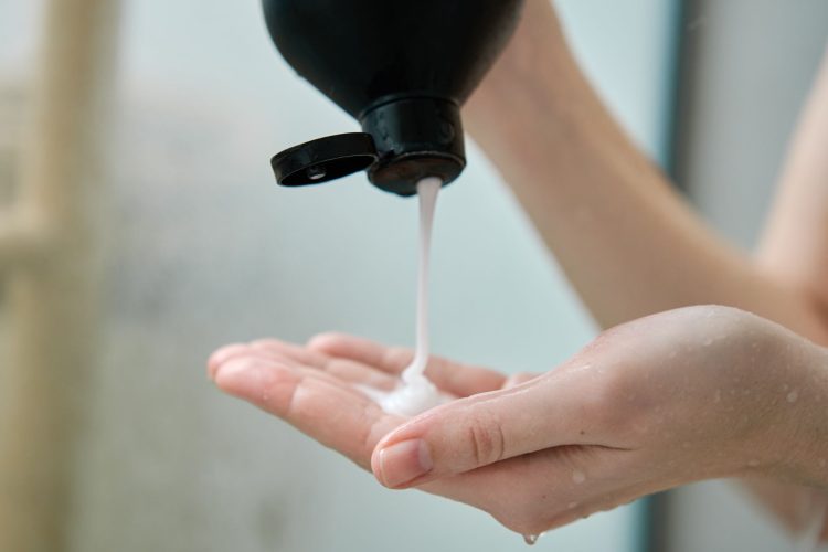 Hair product being applied on hand