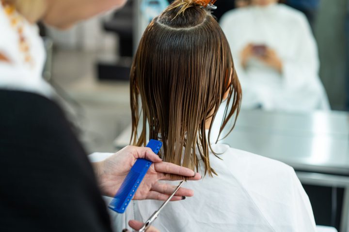 woman-hair-trimming